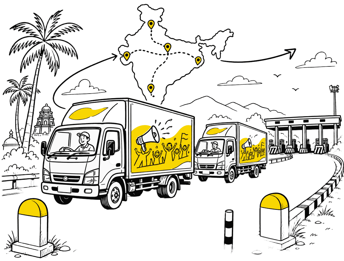 multi-city roadshow convoy of branded canters on an Indian highway